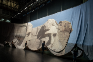 Exhibition installation of the Mount Rushmore backdrop from North by Northwest featured in the Wall Street Journal review