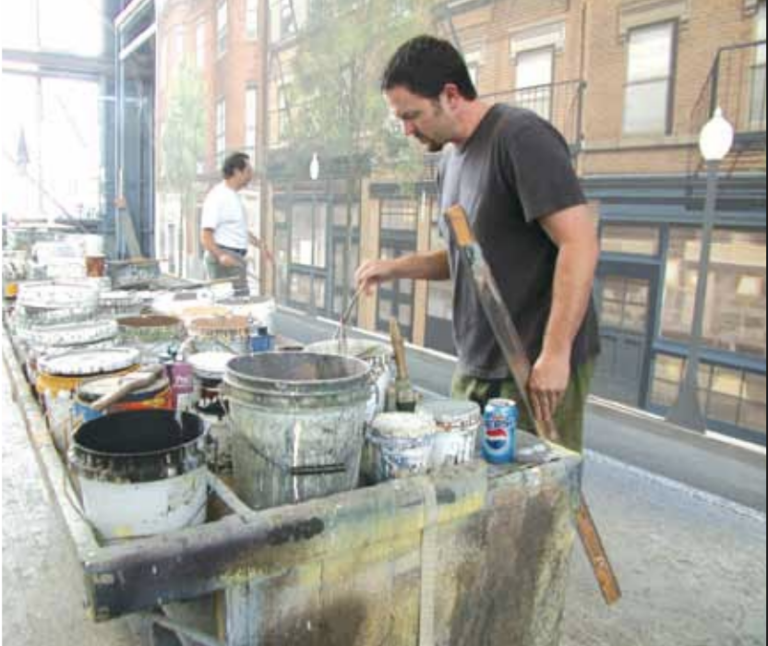 Hollywood scenic artist Andy MacPhee at work in the J.C. Backings loft.